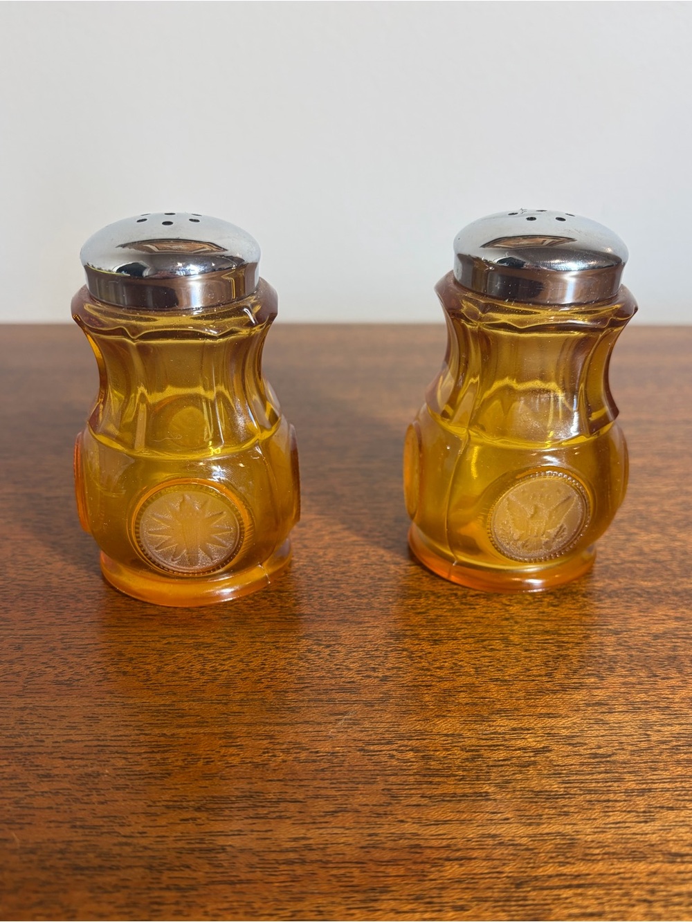 Vintage Fostoria Amber Coin Glass Salt and Pepper Shakers Set Chromed Lids 1958